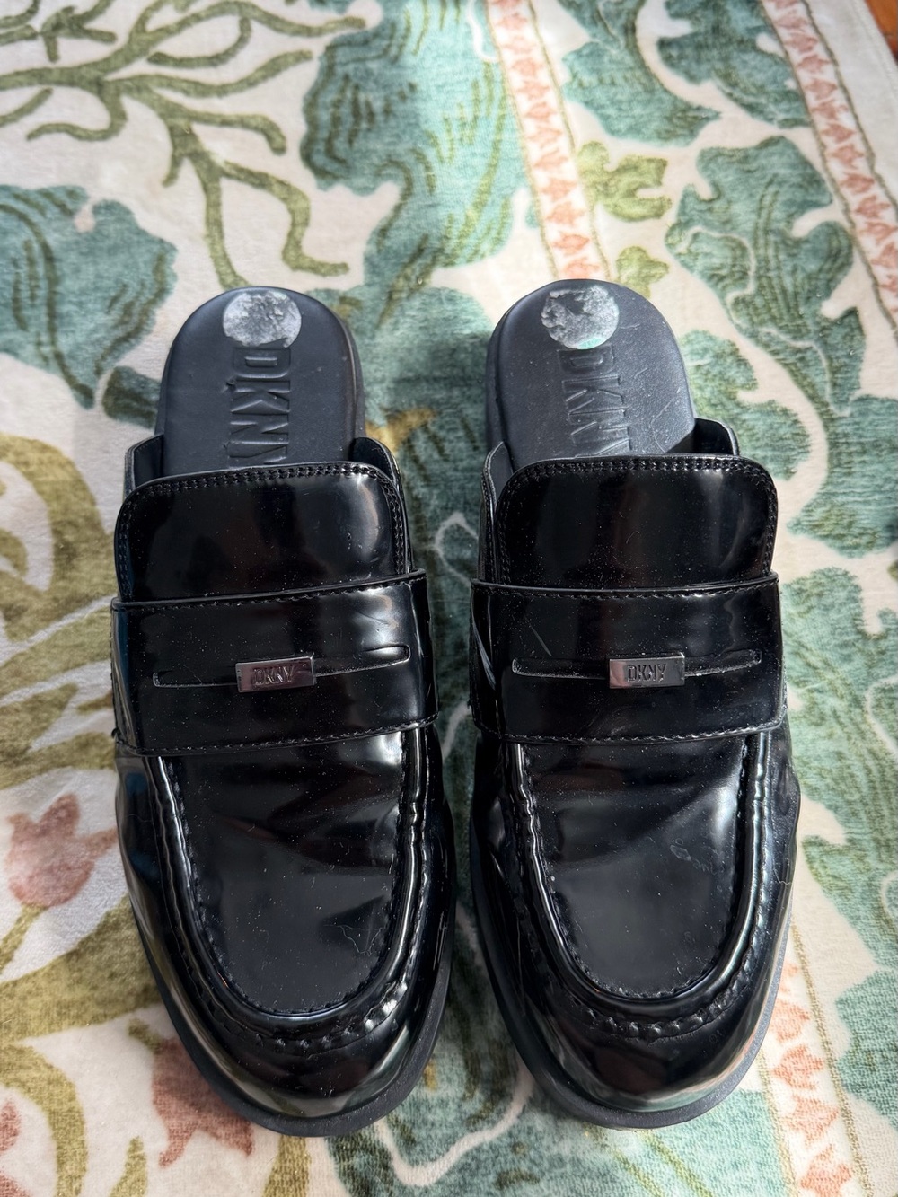 DKNY Black Patent Leather Mules with Logo Plaque